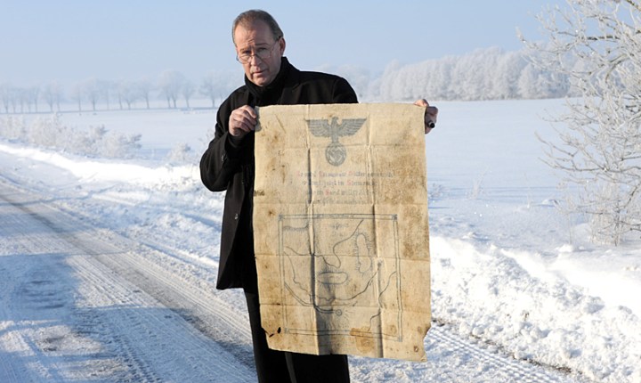 Andreas Uckert e la mappa (Thomas Lebie)