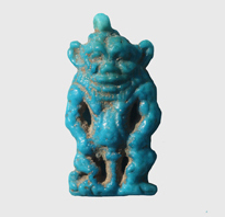 Un pendente a forma del dio Bes (The Amarna Project)