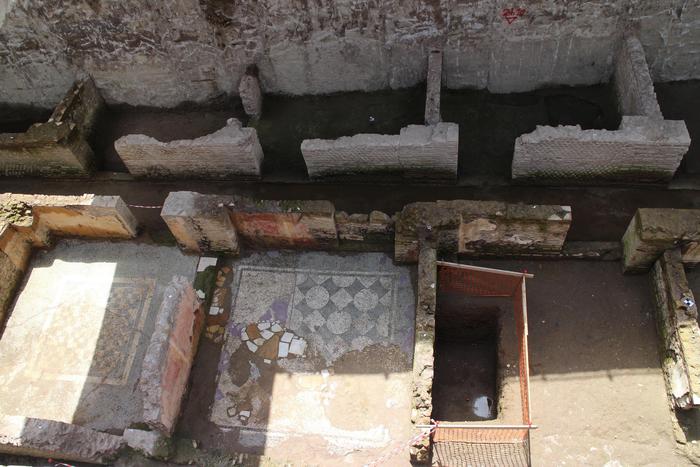 A view of ancient roman ruins and mosaics discovered during work on a new underground line, in Rome, Monday, May 16, 2016. Work on the Metro C being built through the center of Rome has once again run into ancient roman ruins, this time the barracks for the Roman Praetorian guards dating back to the period of Emperor Hadrian, in the second century A.D. Officials say the barracks cover 900 square meters, and include a 100 meter hallway with 39 rooms. ANSA/PAOLA MENTUCCIA